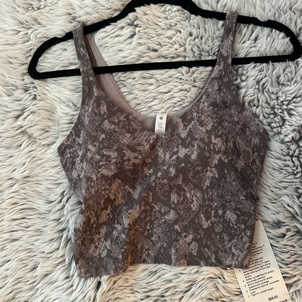 Brand new Lululemon Align Tank (size 6) too big for me, so my loss is your gain!